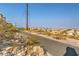 Neighborhood walking path surrounded by desert landscaping and beautiful views at 2653 Rimbaud St, Henderson, NV 89044