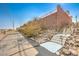 Exterior view of street access to property showing exterior stairs and desert landscaping at 2653 Rimbaud St, Henderson, NV 89044