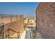 Exterior shot of a home accessible by exterior stairs with block wall and views at 2653 Rimbaud St, Henderson, NV 89044