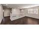 Spacious upstairs landing with white banister, large window and hardwood floors at 2653 Rimbaud St, Henderson, NV 89044