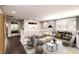 Stylishly staged landing area showcasing white banister, wood floors, and furniture at 2653 Rimbaud St, Henderson, NV 89044