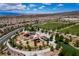 Community playground featuring multiple play structures, seating, and shaded areas, perfect for outdoor fun and recreation at 2653 Rimbaud St, Henderson, NV 89044