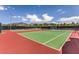 View of tennis courts within the community, featuring green playing surfaces and shade at 2653 Rimbaud St, Henderson, NV 89044