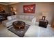 Living area offering modern decor, a sectional sofa, and access to the dining room and kitchen at 270 E Flamingo Rd # 319, Las Vegas, NV 89169