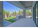 Home's outdoor area including pool, built in kitchen and entertaining space at 34 Vintage Canyon St, Las Vegas, NV 89141