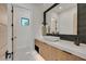 This powder bathroom features contemporary fixtures, including an unique vessel sink at 34 Vintage Canyon St, Las Vegas, NV 89141