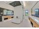 Primary bathroom featuring dual vanities and a soaking tub at 34 Vintage Canyon St, Las Vegas, NV 89141