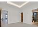 Large bedroom with view of a bathroom, and doors to other rooms at 34 Vintage Canyon St, Las Vegas, NV 89141