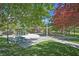 Gathering-friendly community park provides a playground, picnic areas, and lots of shade trees at 34 Vintage Canyon St, Las Vegas, NV 89141