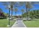 Community park showcases mature trees, lush landscaping, and seating areas to relax at 34 Vintage Canyon St, Las Vegas, NV 89141