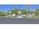 Beautiful two-story home showcasing manicured lawn, desert landscaping, and grand entrance at 34 Vintage Canyon St, Las Vegas, NV 89141