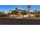 Striking two-story home with desert landscaping, stone accents, and a three-car garage at 34 Vintage Canyon St, Las Vegas, NV 89141