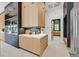 Modern kitchen area features stainless steel appliances, sleek countertops, and light wood cabinetry at 34 Vintage Canyon St, Las Vegas, NV 89141