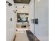 Walk-in shower with dual shower heads and built-in bench at 34 Vintage Canyon St, Las Vegas, NV 89141