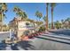 Community entrance with a Cliff Shadows sign and desert landscaping at 3574 Desert Cliff St # 204, Las Vegas, NV 89129