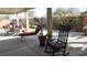 Covered back patio with furniture and garden at 3805 Vidalia Ave, North Las Vegas, NV 89031