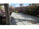 Well-maintained backyard featuring a patio, garden, and lush greenery at 3805 Vidalia Ave, North Las Vegas, NV 89031