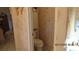 Cozy bathroom showcasing a toilet and built-in storage cabinet at 3805 Vidalia Ave, North Las Vegas, NV 89031
