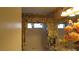 Cozy bathroom with floral wallpaper, vanity with sink, and window at 3805 Vidalia Ave, North Las Vegas, NV 89031
