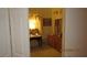 Bedroom view with vanity, decorative masks, and door frame at 3805 Vidalia Ave, North Las Vegas, NV 89031