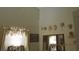 Bright bedroom with vanity, decorative masks, and window with light control at 3805 Vidalia Ave, North Las Vegas, NV 89031
