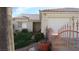Charming single-story home featuring a well-maintained lawn, tile roof, and inviting curb appeal at 3805 Vidalia Ave, North Las Vegas, NV 89031