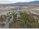 This is an aerial shot of a property in a rural area, surrounded by sparse vegetation and desert landscapes at 4021 Jesse St, Pahrump, NV 89048