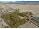 Secluded home surrounded by mature trees offering privacy and scenic desert views at 4021 Jesse St, Pahrump, NV 89048