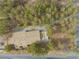 A bird's eye view shows the roof and trees of the property, complemented by street and natural surroundings at 4021 Jesse St, Pahrump, NV 89048