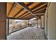 Brick-paved back patio with exposed beams, offering a rustic and inviting outdoor space at 4021 Jesse St, Pahrump, NV 89048