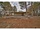 Charming single-story home featuring a covered front patio and natural desert landscaping at 4021 Jesse St, Pahrump, NV 89048