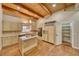 Updated kitchen with center island, modern appliances, and custom cabinetry at 4021 Jesse St, Pahrump, NV 89048