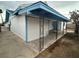 Covered back patio with metal support beams, perfect for outdoor relaxation and entertaining at 4712 Primavera St, Las Vegas, NV 89122
