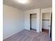 Cozy bedroom features plush carpet, closet space and an entrance to another room at 4712 Primavera St, Las Vegas, NV 89122