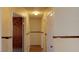 Hallway features beautiful woodwork throughout and entrances to various rooms at 4712 Primavera St, Las Vegas, NV 89122