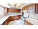 Spacious kitchen with ample cabinet space and modern white appliances at 4712 Primavera St, Las Vegas, NV 89122
