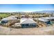 Stunning aerial view showcasing the property's spacious backyard and serene neighborhood setting near the golf course at 4924 E Cactus Canyon Dr, Pahrump, NV 89061