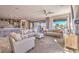 Bright and airy living room with neutral tones, open floor plan and seamless indoor-outdoor flow at 4924 E Cactus Canyon Dr, Pahrump, NV 89061