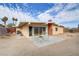 Backyard featuring a patio area with seating, ideal for outdoor entertaining at 5109 Sugarfoot Ave, Las Vegas, NV 89107