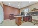 Bright office featuring modern desk setup and good ceiling fan to provide good ventilation at 5109 Sugarfoot Ave, Las Vegas, NV 89107