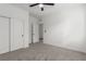 Spacious bedroom with fan, closet and adjoining bathroom at 5147 Stonecrop St, North Las Vegas, NV 89031