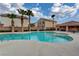 Enjoy this sparkling community pool with tropical landscaping and a relaxing spa at 5453 Brass Hills Ct, Las Vegas, NV 89122