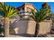Property entrance with palm trees and building signage at 5751 E Hacienda Ave # 172, Las Vegas, NV 89122