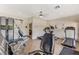 Community gym with high ceilings, ceiling fan, and fitness equipment at 5751 E Hacienda Ave # 172, Las Vegas, NV 89122