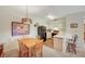 Kitchen and dining area with appliances and a cozy table set for four at 5751 E Hacienda Ave # 172, Las Vegas, NV 89122