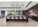 Open kitchen featuring double islands, high-end appliances, sleek countertops, and a modern design at 6 Rockmount Ct, Henderson, NV 89012