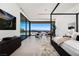 Bright main bedroom with city views, sitting area and dark wood and white decor at 6 Rockmount Ct, Henderson, NV 89012