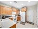 Well-lit kitchen with ample storage and a practical layout for everyday cooking and meal preparation at 6112 Wheat Penny Ave, Las Vegas, NV 89122