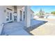 Backyard featuring a covered patio and a large grassy space for outdoor activities and relaxation at 6120 Farm Rd, Las Vegas, NV 89131