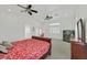 Spacious bedroom with high vaulted ceilings and natural light from the window at 6120 Farm Rd, Las Vegas, NV 89131